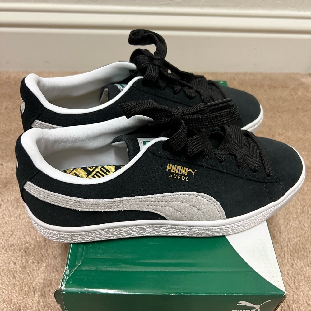 Puma Suede Black and White Sneakers